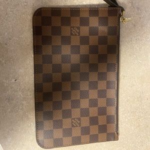 Louis Vuitton pouch came with Neverfull GM